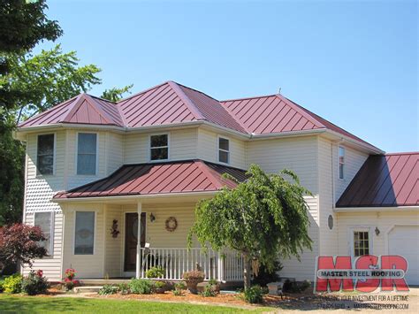 house with gray siding and burgundy metal roof|metal roofing colors.